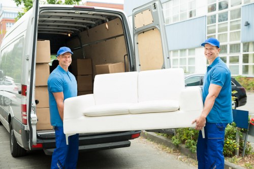 Camdentown man and van team sorting recyclable household items for responsible transfer