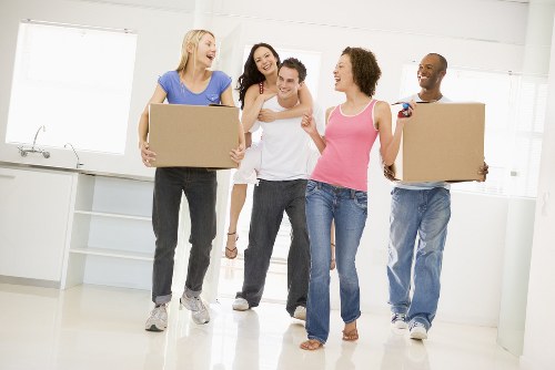 House removal team planning a move in a Camdentown residential street