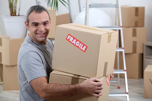 Packed boxes and furniture ready for collection in Camdentown