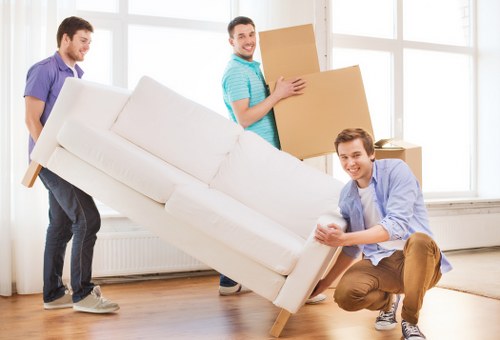 Professional man and van team helping with a Camdentown relocation