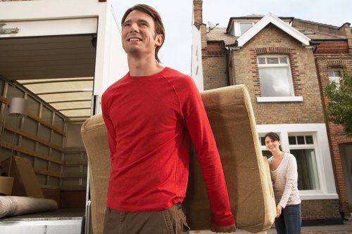 Loading furniture into a removal van for a Camdentown collection