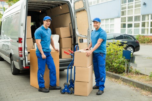 Packed boxes and furniture prepared for transport in Camdentown